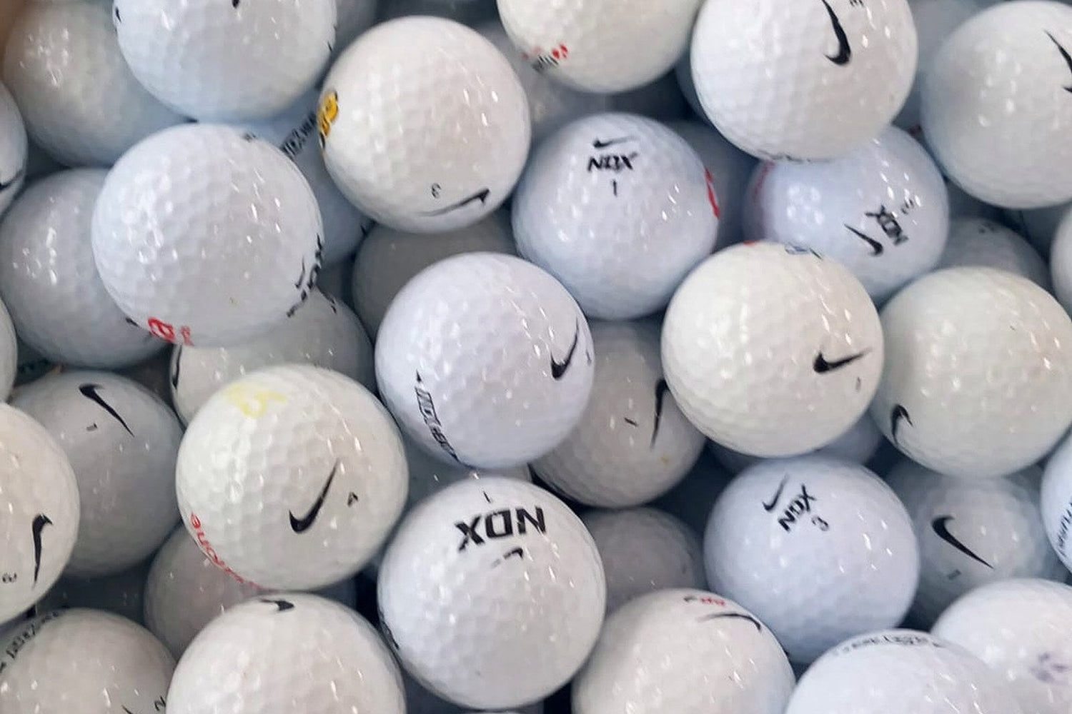 „Nike Mix Golfbälle mit Erfahrung – X-Velocity und weitere Modelle im 50er Netz, TopBall Schweiz"