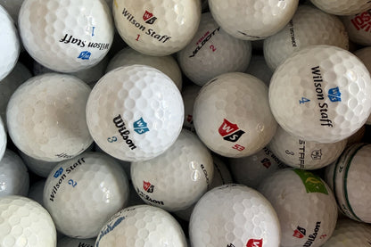 Wilson Staff Mix – gebrauchte Golfbälle mit Erfahrung, Nahaufnahme aus dem TopBall Lager